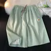 Pantalones cortos casuales de seda helada ligeros de verano para hombre, pantalones deportivos de baloncesto hasta la rodilla, pantalones versátiles holgados de moda estilo americano