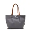 Bolso tote de nylon impermeable estilo minimalista nuevo 2026, gran capacidad, adecuado para mujeres, estudiantes, para ir al trabajo, al trabajo y para ir de compras, bolso de hombro