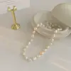 Collar de perlas de agua dulce barrocas con cuentas de cobre espaciadoras para mujer, collar de moda con cadena para la clavícula de perla irregular