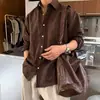Camisa de manga comprida estilo americano, com corte solto e design Maillard para homens, adequada para primavera e outono, jaqueta de camisa de trabalho casual de cor sólida com corte solto
