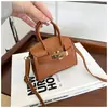 Coleção nova 2025: bolsas femininas estilosas e da moda, com material PU em cores doces, mini bolsas crossbody e porta-moedas fofos