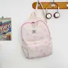 Nova mochila estudantil transfronteiriça de grande capacidade, alças de ombro ajustáveis, leve e respirável, adequada para uso casual diário