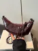 Bolsa Saco Transfronteiriça 2026 Verão Nova Bolsa Feminina Moda Design de Nicho Elegante Bolsa de Ombro Simples Retrô Bolsa Transversal