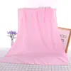 Venta al por mayor del fabricante 70*140 Toalla de baño en relieve Fibra fina Engrosada Toalla de playa Suave Absorbente Toalla grande Amigable con la piel