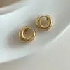 Pendientes de circonita redonda texturizada transfronterizos europeos y americanos, estilo nicho, sensación de alta gama, pendientes exquisitos y sencillos para mujer
