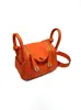 2025 Nova Bolsa Transversal Casual de Moda Primavera e Verão Mini Bolsa Lindy Feminina de Mão Couro Genuíno Bolsa Feminina de Ombro Bolsa de Remédios