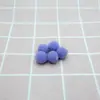 Paquete pequeño en stock Bola de pelo de alta elasticidad Bola pequeña de pelo de poliéster Bola de felpa colorida Bola de pelo hecha a mano accesorio de bola de pelusa para DIY