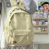 Nova Mochila Simples com Letra Bolsa de Ombro Duplo Bolsa Escolar de Estudante Grande Capacidade Leve Ensino Fundamental Ensino Médio Universidade Deslocamento