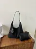 Bolso tote de gran capacidad para mujer, nueva versión coreana 2026, bolso de hombro versátil de moda de alta gama para el trabajo, retro, moderno