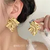 Pendientes geométricos metálicos plisados únicos 2025 explosiones de comercio exterior alta atmósfera moda retro personalidad temperamento pendientes