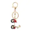 Llavero Colgante Creativo de Coche Eléctrico Coreano Pequeño Regalo Colgante de Metal para Bolso de Mujer Colgante para Llave de Coche