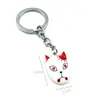 Llavero colgante de aleación de metal con diseño de mariposa Zhilang You Bean de Anime Ghost Extermination Blade que rodea el carbón. Comercio exterior.