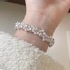Pulsera de Garra de Gato con Perlas Estilo Moda Francés Nicho Dulce Manta Rosa Perla Shijia Elástica de Alta Gama