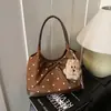 Bolso Tote Retro Casual Transfronterizo para Mujer Otoño 2026 Nuevo Estilo Coreano Moda Tendencia Lunares Bolso de Hombro Bolso Grande de Capacidad para Mujer