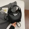 Bolsa pequeña popular con estampado de lichi para mujer, nueva bandolera de cubo de moda con textura para el trabajo 2026