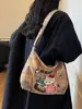 Bolso de hombro para mujer con estampado lindo, nuevo bolso cruzado de lona versátil de moda, bolso de axila moderno para el día a día