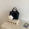 Bolso Cubo Minimalista de Alto Valor Transfronterizo para Mujer, Nuevo Primavera 2026 Vintage de Nicho para el Trabajo y el Viaje Diario Bolso de Hombro