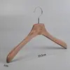 Estante para pantalones de tienda de ropa sin marcas antideslizante clip fuerte para pantalones resina con veta de madera imitación colgador de pantalones ecológico clip de moda para faldas clip para pantalones al por mayor