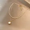 Collar de perlas apiladas de doble capa para mujer otoño e invierno 2023 nuevo de moda diseño de nicho de lujo ligero cadena de clavícula exquisita