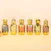 Botellas de Vidrio para Aceites Esenciales al por Mayor, Botellas de Spray para Perfume, Botellas con Rodillo, Botellas Dispensadoras Cosméticas Electroplateadas, Botellas Estampadas en Oro