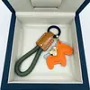 Fique Rico Imediatamente Pingente de Chaveiro de Couro de Vaca Feito à Mão para Carro Lanyard Elegante Simples Exquisito para Casais Masculinos e Femininos