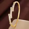 Pulsera de Cuatro Hojas con Diseño de Línea Irregular de Moda, Superventas Transfronteriza Europea y Americana, Venta Directa del Fabricante