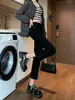 Diseño jeans rectos para mujer 2024 primavera nuevos de cintura alta elásticos pantalones baguette pantalones de tubo con abertura pequeña