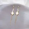 Aguja de plata 925 puesto mercado nocturno suministro aretes moda mujer asimétricos populares explosiones japonesas y coreanas aretes al por mayor A