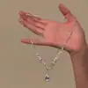 Conjunto de Colar e Brincos Gota d'Água Azul Fresco para Mulheres, Luxo Leve, Elegante e de Alto Padrão Corrente de Clavícula