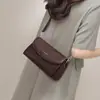 Bolsas 2026 Estilo Nuevo Bolso de Mujer Verano Hombro Cruzado Bolso de Mano Pequeño Casual de Alta Gama Moda Retro Viajero