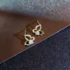 Pendientes pequeños y sencillos de circonita 2021, nuevos pendientes de mariposa huecos dulces para estudiantes de moda.