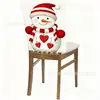 Fundas de silla navideñas superventas transfronterizas con diseños de muñeco de nieve y renos de dibujos animados, fundas para sillas de comedor y fundas para respaldos de decoración festiva, disponibles para venta al por mayor