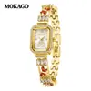 Reloj de Comercio Exterior Mokago con Pulsera de Brazalete de Cobre Mariposa Deslumbrante, Reloj de Cuarzo para Mujer de Alto Valor a Prueba de Agua Estilo Chanel
