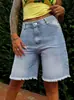 Jeans de cinco puntos con dobladillo deshilachado transfronterizos para mujer, nuevo de verano 2026, shorts versátiles casuales para el trabajo, adelgazantes