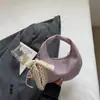 Bolsa Feminina de Designer de Nicho 2026 Novo Modelo Textura Macia Bolsa de Mão Nuvem Bolsa Dumpling Bolsa de Mão Simples e Fashion