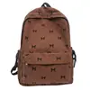 Mochila Escolar Pequeña Versátil Popular con Estampado de Mariposas Transfronteriza Mochila para Estudiantes Mochila de Pana Mochila Ligera Simple Casual
