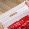 Bolsa de plástico para regalo de ropa de mano de cuatro dedos con boca plana personalizada de fábrica, bolsa gráfica portátil, logotipo personalizado, gran cantidad, excelente
