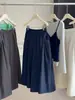 Saia Feminina Nova Primavera e Outono com Cintura Elástica, Bolsos Soltos, Cintura Alta, Corte em A, Grande Balanço, Comprimento Médio, Estilo Guarda-Chuva