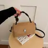 Bolso de mano de gamuza de alta gama para mujer, un nuevo estilo popular, moderno, casual, versátil y adecuado para ir al trabajo, se puede llevar como bolso de hombro o bolso cruzado.