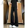 Pantalones de traje de pierna curva versátiles estilo Hong Kong para hombre, otoño, temperamento simple, sin planchado, tacto de alta gama, microcampana, largos