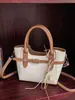 Yuezhi 2026 principios de otoño nuevo moda casual personalizado retazos bandolera hombro nuevo bolso de viajero bolso de mano vintage