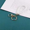 Bolso de Perlas Artificiales Cadena de Perlas Cadena Corta Llavero Cadena Colgante Funda de Teléfono Móvil Llavero Colgante Decorativo Pequeños Accesorios de Joyería