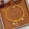 Bestseller de Xiaohongshu Pulsera de Cuatro Hojas con Tachuelas de Diamante Color Oro Arena y Perla Blanca de Luna para Mujer Nicho Lujo Ligero Tendencia de Gama Alta