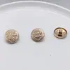 Hebilla de Metal Cosida a Mano Raya Doble León Abrigo Botón Redondo Traje Suéter Botón Dorado Uniforme Escolar Hebilla Decorativa