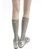 Meias Miu style finas transparentes cinza estilo simples salto alto etiqueta de tecido em inglês meias franzidas de comprimento médio para a panturrilha meias brancas leitosas para a panturrilha
