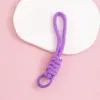 Llavero cordón de cuerda trenzada de nailon para hombres y mujeres hebilla de montañismo cuerda de mano para parejas colgante de bolsa teléfono llave lazo