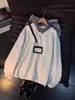 Sudadera de cuadros tipo patchwork estilo americano, imitación de dos piezas para hombre, marca nueva y moderna, diseño holgado, top versátil con cuello polo, moderno