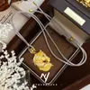 2026 Nuevo Modelo Dorado Arena Vietnamita Mismo Estilo que Master Meng Grabado Cepillado Diamante Azul Caballo Zodiaco Collar Regalo de Año Nuevo Venta al por Mayor