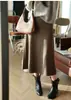 Falda midi elegante de acetato y lana estilo francés Yunshuyaxu, de cintura alta, línea A, que cubre la cadera, adelgazante y fluida para el trabajo