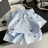 Polo Bebé Niños y Niñas Verano 2026 Estilo Universitario Manga Corta Conjunto de Moda Chaleco Nuevo Conjunto de Dos Piezas para Niños